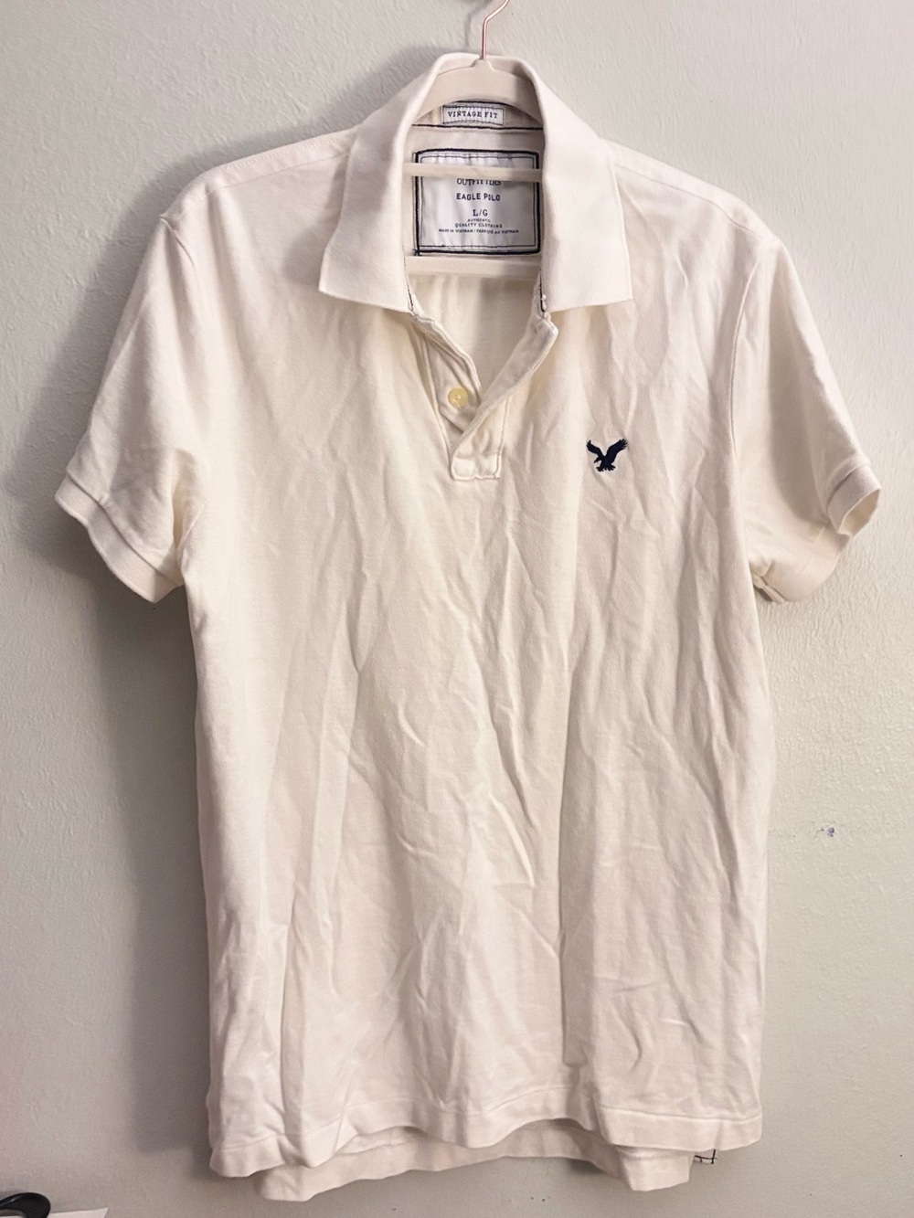 American Eagle Outfitters Men’s Cream Polo with Navy Logo